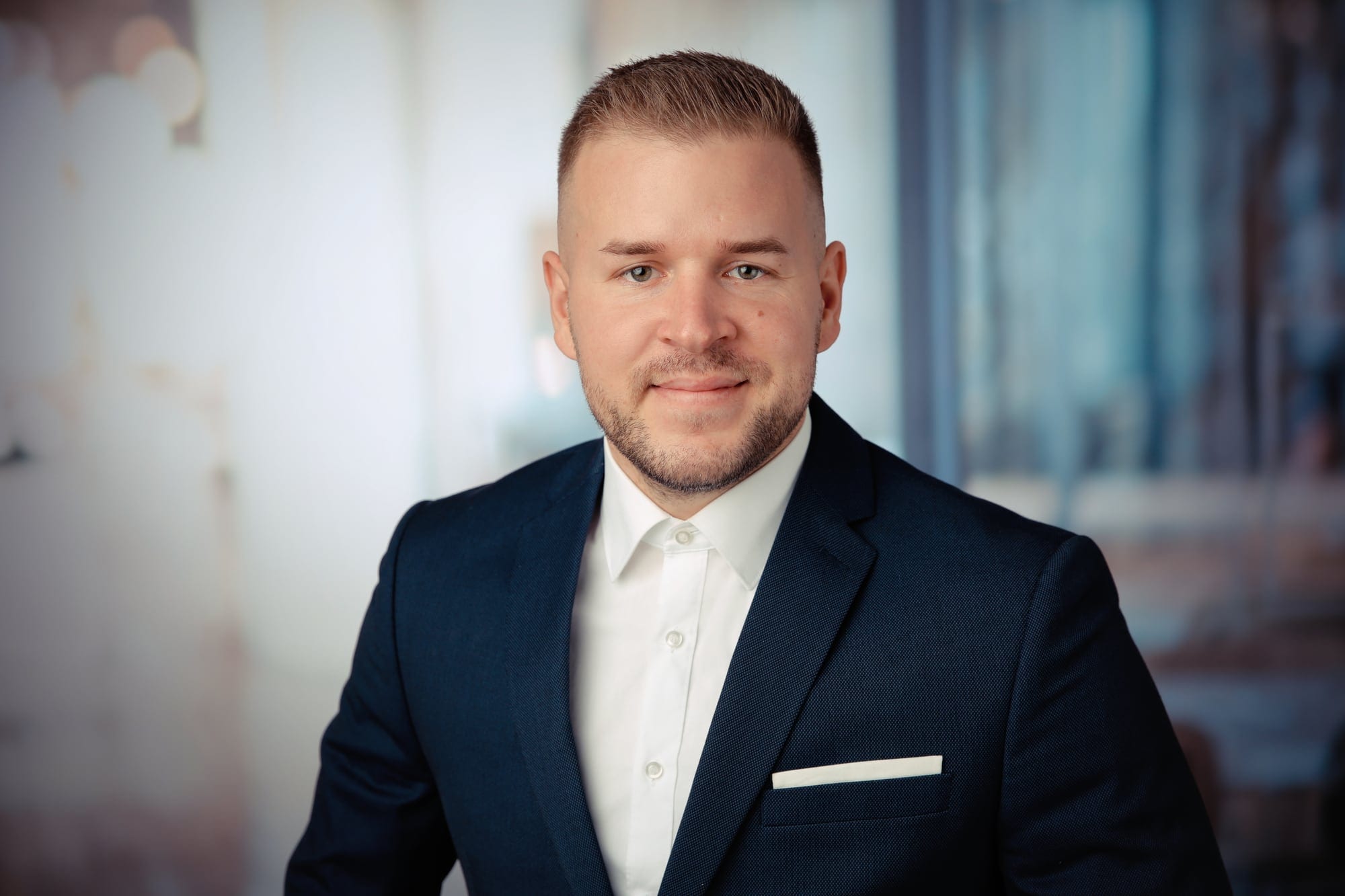 Jakob Megow in a dark blue suit